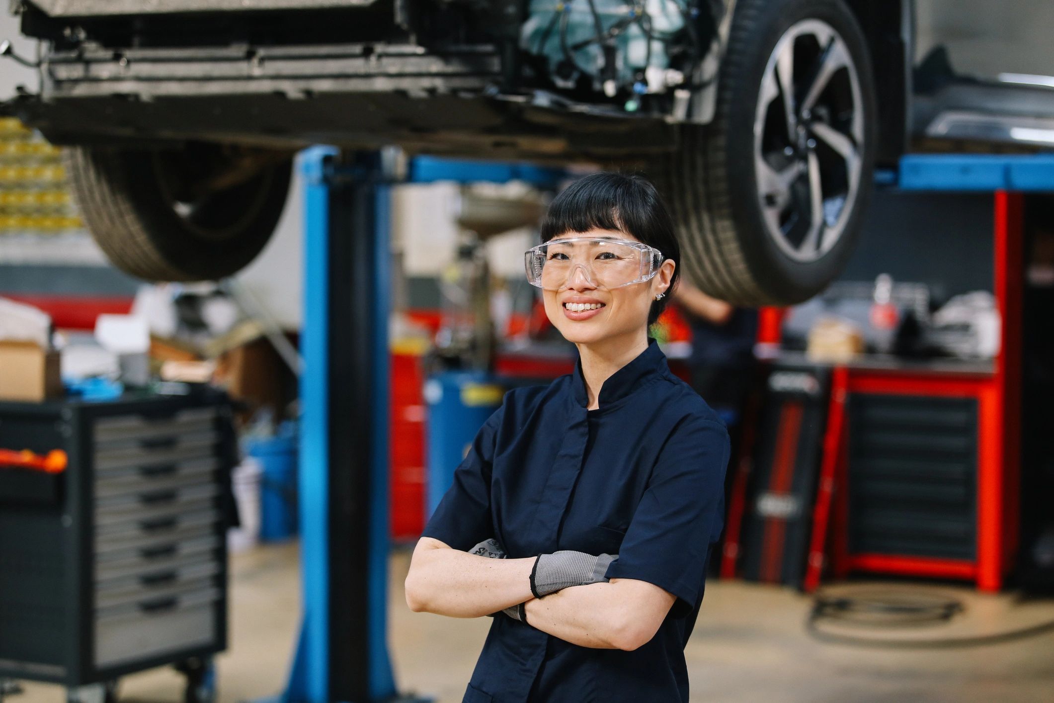 Mechanic performing routine car inspection