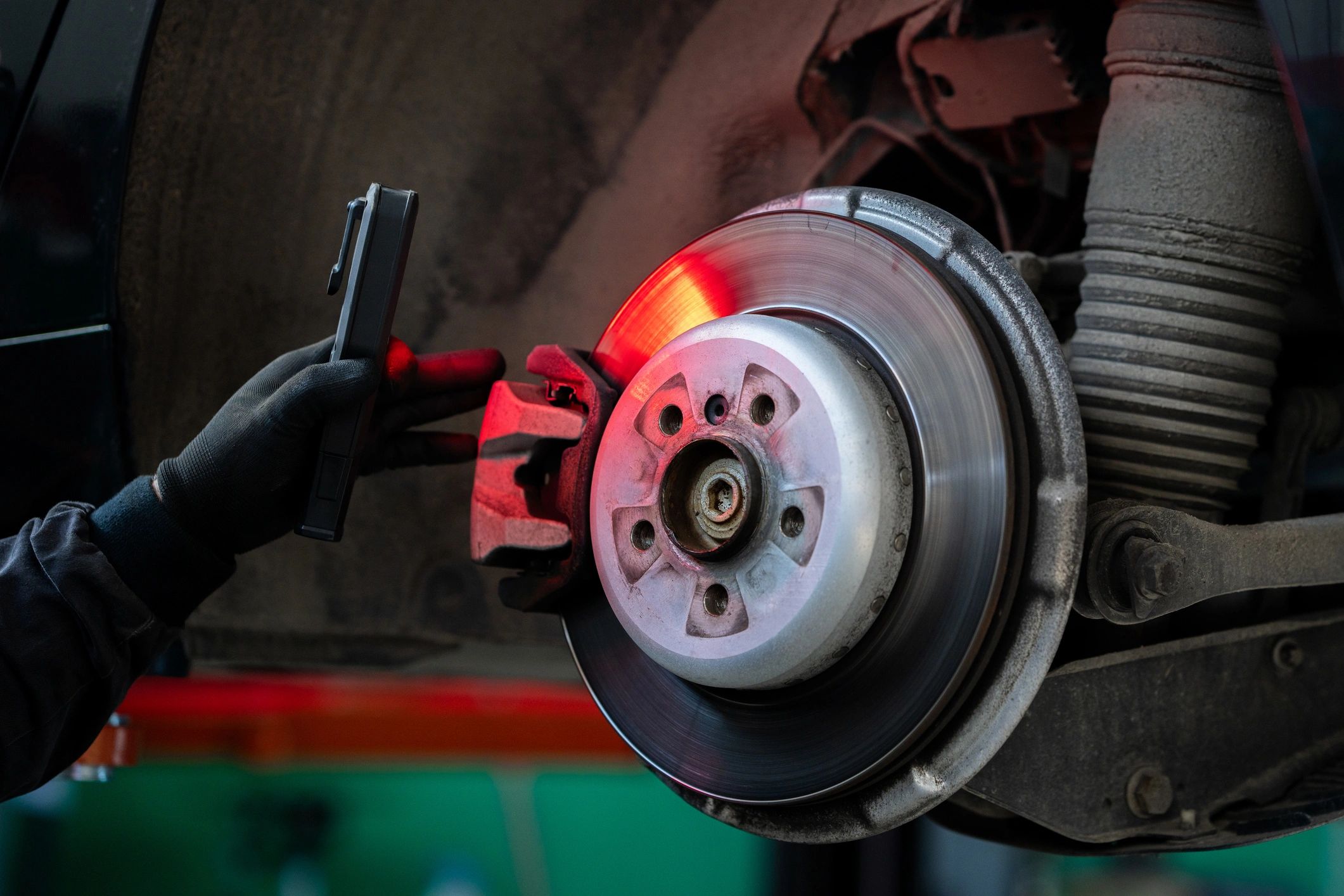 Technician inspecting brake discs